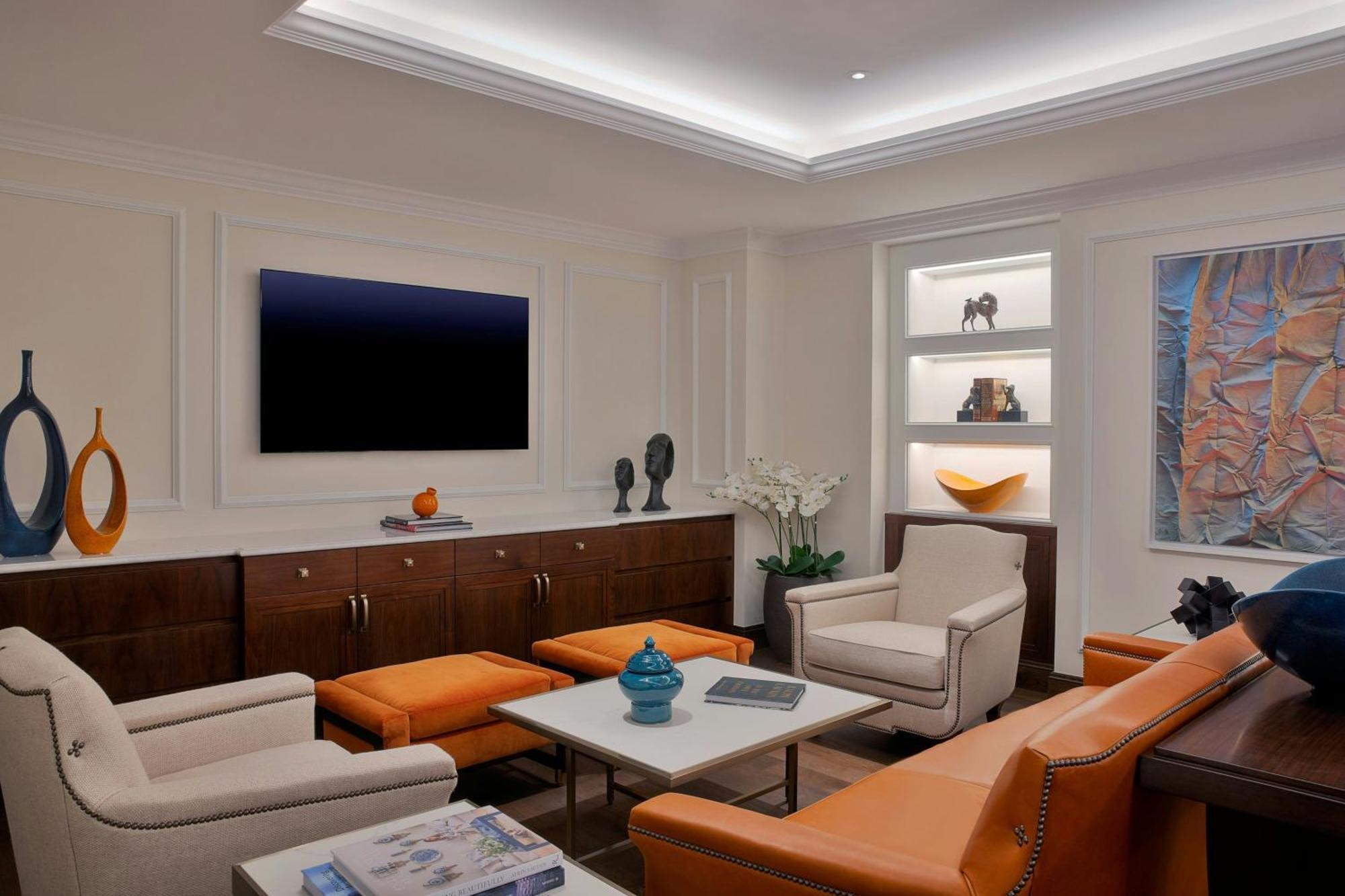 The Ritz-Carlton, Amman Hotel ภายนอก รูปภาพ A living room with indirect lighting